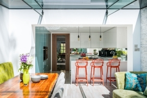 Bespoke luxury stylish kitchen, frame less glass box extension, Jacuzzi, moss wall
